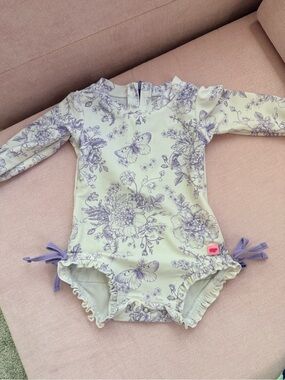 Ruffle Butts Cream and Lavender Floral Butterfly Long-Sleeve Swim Bodysuit